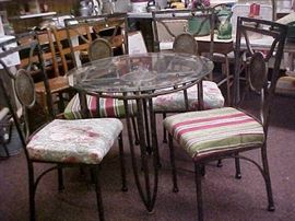 IRON SET GLASS TOP TABLE AND 4 CHAIRS
