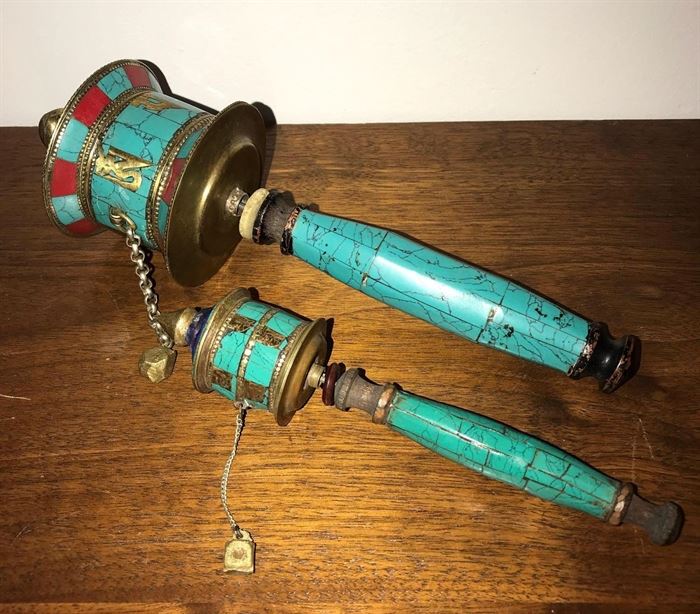#2201: Fantastic pair of Tibetan prayer wheels
Unusual pair of turquoise metal collar Tibetan prayer wheels. The tops  are removable and there is a wonderful surprise with a scroll is inside.

Small, 7".
Large, 9.5".

Bid per piece, Final bid x 2