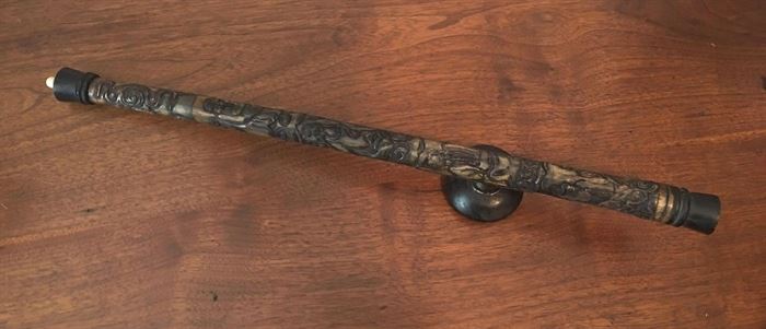 #2262: Rare, Chinese Opium Pipe
Rare, fine Chinese Opium pipe with intricate carving and metal saddle.

19"L