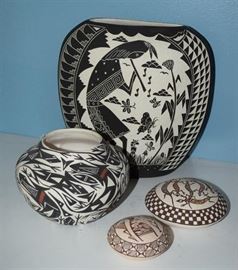#2213: Signed pottery Collection
Lovely pottery collection with a striking patterns of black and white, signed.

8.5"H and less