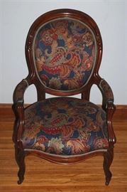 #2351: Oval back carved arm chair
Oval back carved arm chair, beautiful rich tone fabric.

24" x 27" x 41.5"H