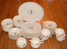 #2279: Dinnerware set
Dinnerware set.

1 serving dish 13.5 x 11 *small chip.
1 creamer 3.25"D.
1 sugar 4"D.
7 teacups 4"D.
17 saucers 6.25"D.
8 plates 10"D.
8 sauce bowls 5.5"D.
8 bowls 5.5"D.