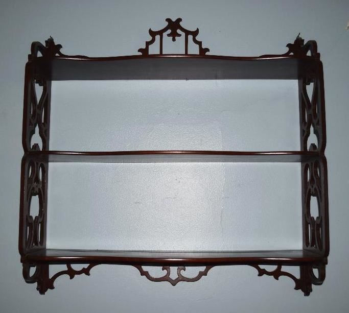 #2222: Stunning Display Shelf with Carving Detail
Stunning display shelf w/carved wood detail, with two shelves.

24.5"L x 6"D x 24.5"H
