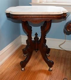 #2172: Fantastic Marble top Mahogany side table
Fantastic solid marble top side table. Old world craftsmanship, enjoy the beauty of the curved thick white marble, set on a carved mahogany base.

28.5L x 21"W x 31"H