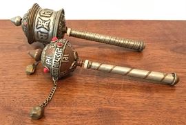 #2202: Tibetan metal prayer wheels
Tibetan metal prayer wheels A great pair of Tibetan handcrafted metal prayer wheels. As you hold the handle with a clockwise motion the prayer wheels will spin.Wonderful surprise with a scroll is inside.

Small, 7.25".
Large, 8.25".

Bid per piece, Final bid x 2