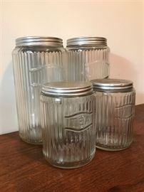 #2211: Old Fashioned Mason Jars
Classic design set of four mason jars with lids. Perfect for countertop display of your favorite ingredients.

(2) 4.5" Height & (2) 7.5" Height 