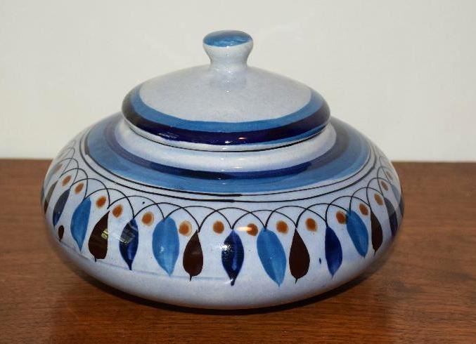 
#2221: Covered pottery dish, hand painted
Covered pottery dish, hand painted.

7"D x 5"H