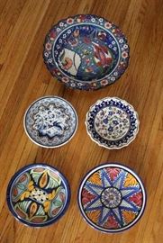#2333: Decorative Hand Painted Pottery Plates Set of 5
Decorative Hand Painted Pottery Plates Set of 5.

7"D / 7.25"D / 8"D / 8.75"D / 12"D
