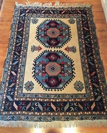 #2403: Original Kazak Handmade Rug
Authentic handmade Kazak rug.
100% wool, wonderful pallette of color.

4.10” x 6.6”