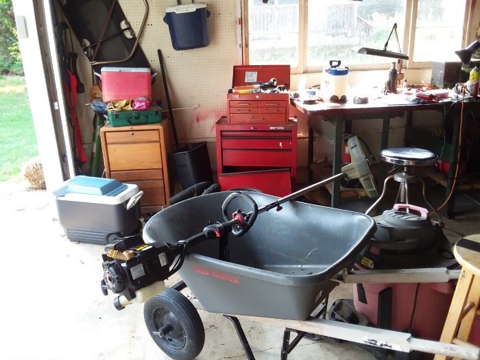 Total garage sale, weed wacker, wheel barrel, sets of tools  - wrench sets, hammers, screw drivers, antique saw and sikel, ladders, ice fishing hut with sled, rakes, shovels, some sporting equipment