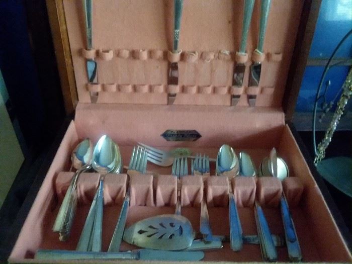 Two sets of Rogers flatware - two wooden boxes for storage with all serving pieces.