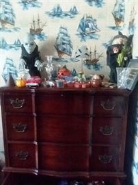 Antique chest of drawers with matching dresser and mirror.  Lots of holiday decorations