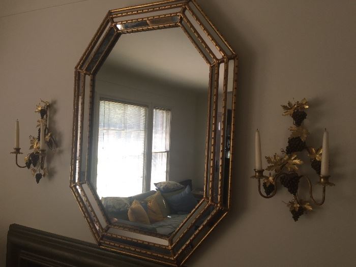 Mirror with beveled edges, candle sconce pair
