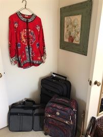 luggage, framed prints and silk clothing