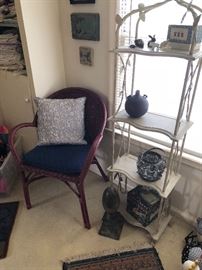 wicker arm chair, tiered shelf and ceramic tiles