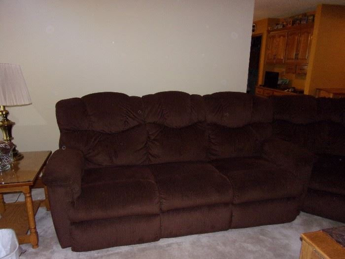 Sectional couch with reclining seats (4) on each end. Pictured is 3 seat sofa with arms at each end.