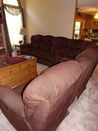 Sectional couch with reclining seats (4) on each end.  (coffee table not for sale)