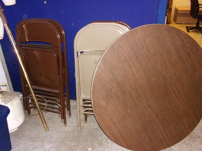 Vintage round card table and fold up chairs.