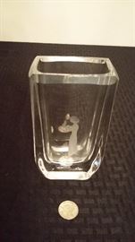 Crystal vase with lady and bird etching. Has signature.