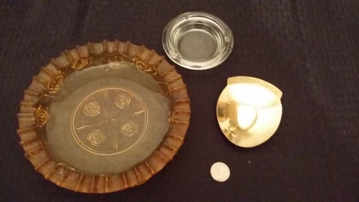 Vintage ashtrays and brass "Pocket Change" dish.