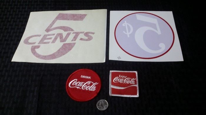 Coca Cola stickers and patches.