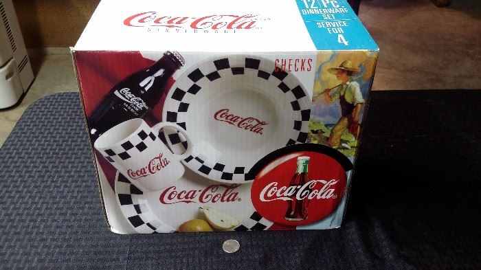 Coca Cola 12 piece dinnerware set. New in box. (2)