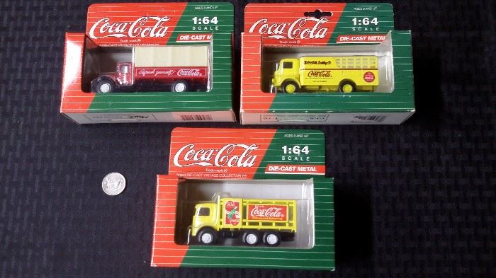 Coca Cola die cast trucks.