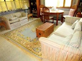 Clean like new sofas and oriental carpet