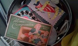 Bins of sewing thread and supplies---at least five cases