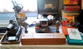 8mm film editor, projectors, lighting and accessories all in pristine condition