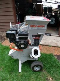 BRUSH-MASTER Chipper/Shredder 15HP ! This isn't a toy. Says it will do a 2x4! Buy it and give it a try. I prefer chipping the 2" to 2-1/2" branches which it will do with ease. Great condition with hitch for garden tractor.