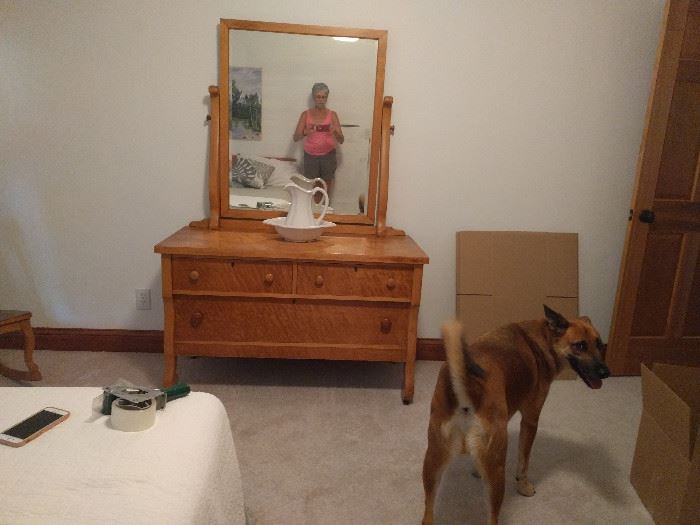 Birdseye maple bedroom set, includes dresser with mirror shown (photo-bombing dog not included!), full-size bed, oval table, rocker, & straight chair. Original finish. See next 4 pictures.