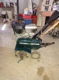 5 HP Sears tiller. Just keeps on running. Starts in a pull or two.