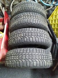 Four Firestone Winterforce Tires