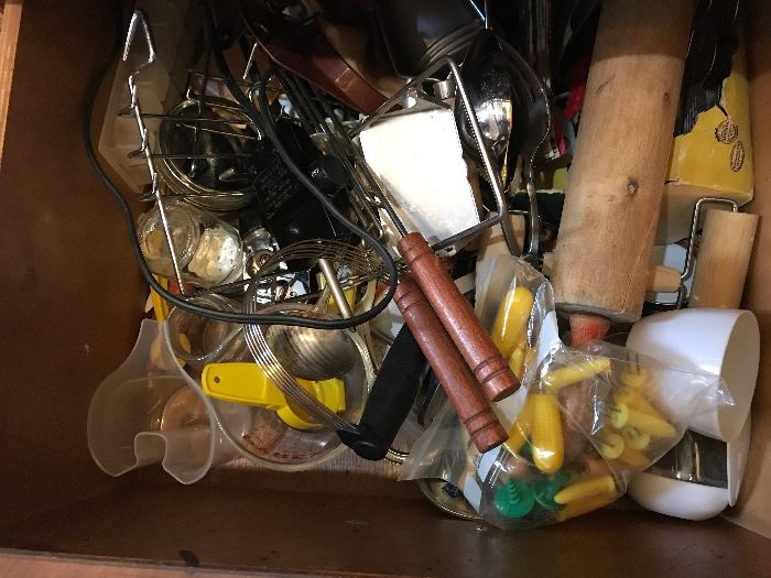 LOTS of kitchen utensils. 