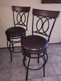  Two barstools with padded seats 