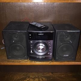  Small  stereo with CD player and two speakers made by Sharp 