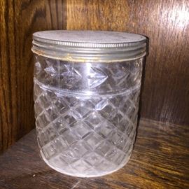  Small antique jar with tin lid