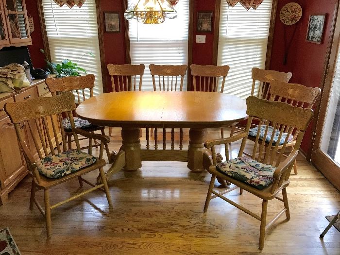 8 Solid Oak chairs go with this beautiful Table-6 side chairs & 2 Capt Chairs