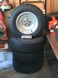 15" 5 hole Chevy Truck tires w nice Aluminum wheels & caps