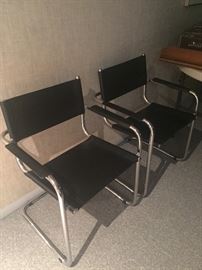 Modern chrome and leather arm chairs - 2 available 