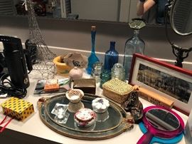 Small porcelain boxes, blown glass bottles and more - bathroom accessories