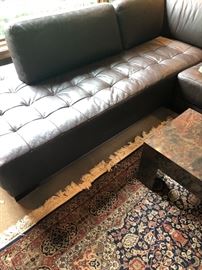 Leather Couch and hand-made area rug - 8 x 10 and edge of coffee table (side table also available)