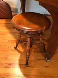 Claw-footed piano stool