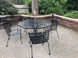 Club patio chairs and table with umbrella