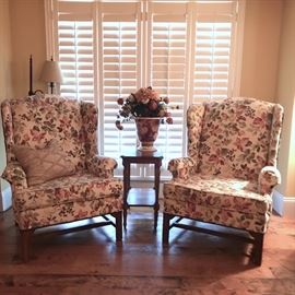 Pair of vintage high back wing chairs. Maker unknown.