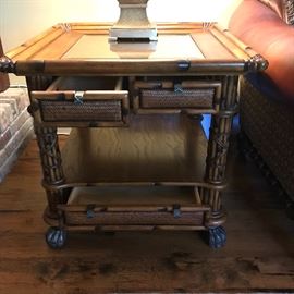 Side table with 3 storage drawers.