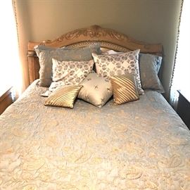 Beautiful queen bedcover and coordinating pillows.