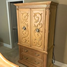 Storage armoire measures 43" wide, 75" high and 19" deep.