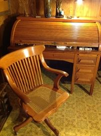 Must see the detail in this oak desk very good condition with matching Oak Cane Chair GUNN Antique Roll Top Desk w/ locking compartments & keys carved wood on all 4 sides, must see very good condition